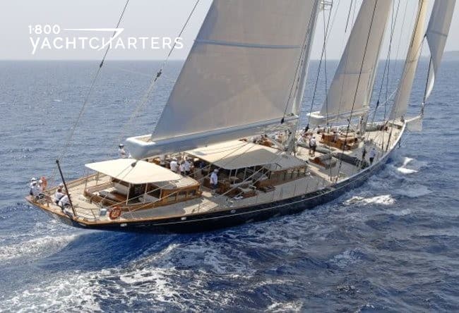 Aerial photograph of sailing yacht ATHOS underway. She is headed toward the top right corner of the photo.