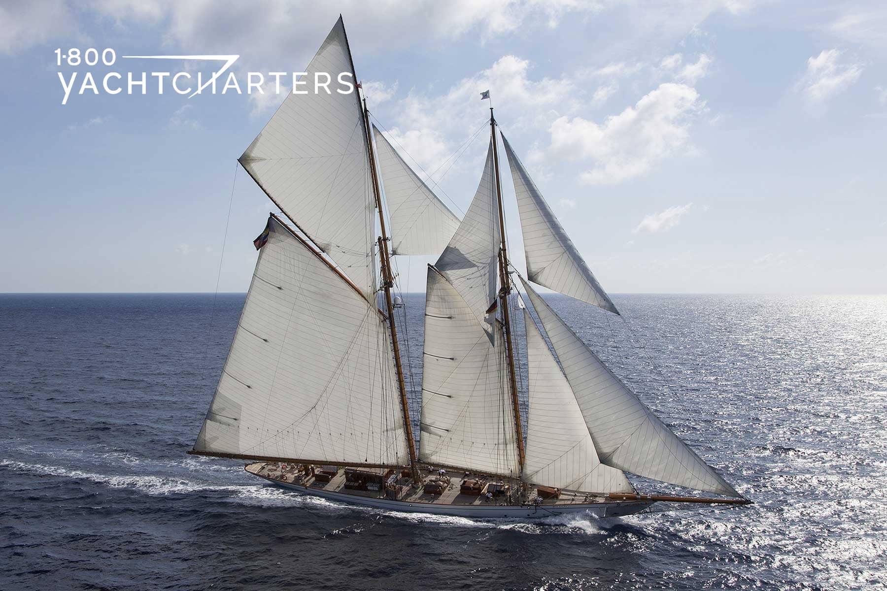 Profile photograph of classic sailboat, Germania Nova, underway