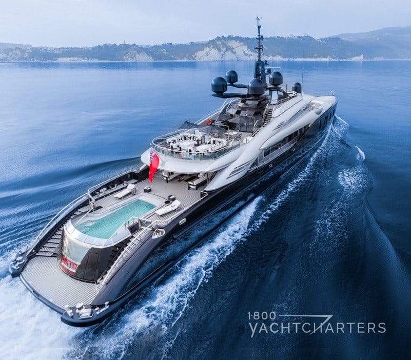 OKTO superyacht aerial running shot showing swimming pool on back deck