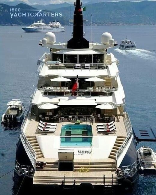 View from above the back of the yacht that shows all decks and swimming pool